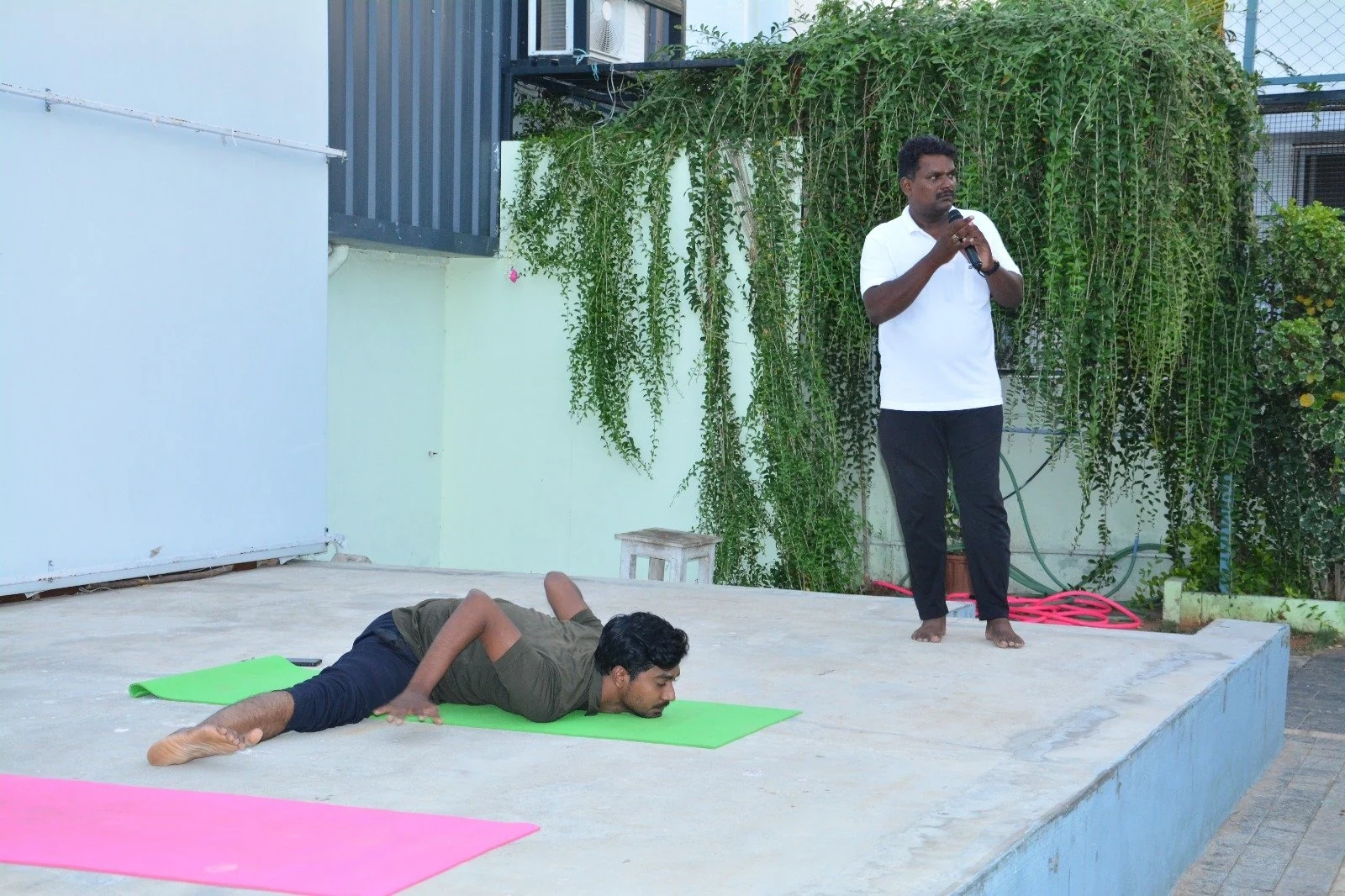 Yoga demonstration with an instructor at Imayam Yoga Center